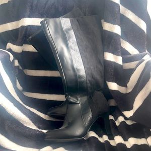 Black high heel boots Size: 9.5